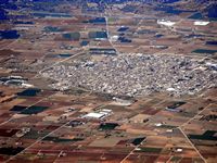 La localidad de Sa Pobla Mallorca - Vista aérea de Sa Pobla desde el sureste (autor Aisano). Haga clic para ampliar la imagen.