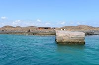 A ilha de Lobos em Fuerteventura. O molhe de El Puertito. Clicar para ampliar a imagem em Adobe Stock (novo guia).