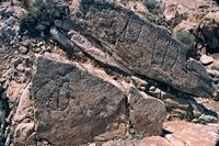 The village of Tindaya in Fuerteventura. Engravings podomorphes on the Montaña de Tindaya (author Jo Hammer). Click to enlarge the image in Panoramio (new tab).