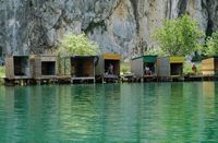 Huts of fishermen on Cetina close to Omitted. Click to enlarge the image in Adobe Stock (new tab).