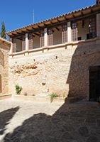 The hermitage of Sant Honorat de Randa Mallorca - Court of the church. Click to enlarge the image in Adobe Stock (new tab).