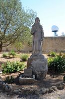 The Sanctuary of Cura de Randa Mallorca - Statue of Ramon Llull in the garden of the sanctuary. Click to enlarge the image in Adobe Stock (new tab).