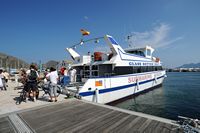 El pueblo de Port de Pollensa en Mallorca - El servicio de transporte a la playa de Formentor. Haga clic para ampliar la imagen.