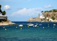 Port de Sóller in Mallorca - Lighthouse Bufador and flagship of the Cross. Click to enlarge the image.