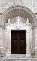 De stad Santa Margalida in Majorca - het portaal van de kerk Sint-Margriet (auteur Olaf Tausch). Klikken om het beeld te vergroten.