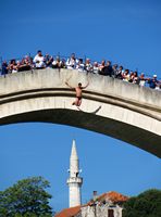 Jump in Neretva since the old bridge (author Michael Bueker). Click to enlarge the image.