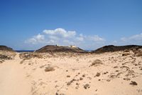 A ilha de Lobos em Fuerteventura. Farol de Martiño. Clicar para ampliar a imagem em Adobe Stock (novo guia).