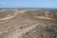 Die Insel Lobos in Fuerteventura. Lavastrom von Caldera. Klicken, um das Bild in Adobe Stock zu vergrößern (neue Nagelritze).