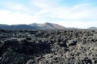 Timanfaya National Park in Lanzarote. The Montanas del Fuego views from the park entrance. Click to enlarge the image in Adobe Stock (new tab).