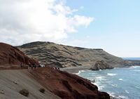The village of El Golfo in Lanzarote. Access to the Green Lagoon. Click to enlarge the image in Adobe Stock (new tab).