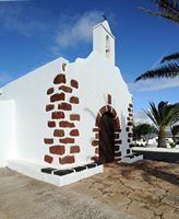 The village of La Vegueta de Yuco in Lanzarote. The Chapel of Our Lady of Regla. Click to enlarge the image in Adobe Stock (new tab).