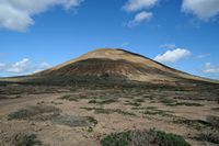 Die Insel Graciosa nach Lanzarote. Der Vulkan Agujas Grandes. Klicken, um das Bild zu vergrößern