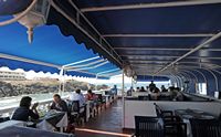 Het dorp El Cotillo in Fuerteventura. Het restaurant La Vaca Azul. Klikken om het beeld te vergroten.