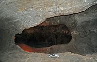 De grot Cueva de los Verdes in Haría in Lanzarote. Opgestapelde slangen. Klikken om het beeld te vergroten.