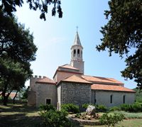 Le village de Povlja, île de Brač en Croatie. L'église Saint-Jean-Baptiste. Cliquer pour agrandir l'image dans Adobe Stock (nouvel onglet).