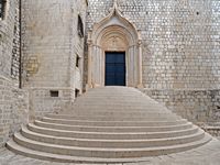 Southern gate of the church of Dominican. Click to enlarge the image in Adobe Stock (new tab).