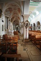 The left side aisle of the church of the Annunciation. Click to enlarge the image in Adobe Stock (new tab).