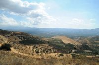 La ville de Mirès en Crète. La vue en direction de Gortyne depuis le labyrinthe de Gortyne. Cliquer pour agrandir l'image dans Adobe Stock (nouvel onglet).