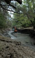 Draining the pond in the valley of the seven sources Rhodes. Click to enlarge the image.