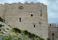 Muralha restaurado do castelo de Kastelos à Rodes. Clicar para ampliar a imagem.
