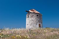 O moinho de Papavasili à Kéfalos sobre a ilha de Kos (autor Michal Osmenda). Clicar para ampliar a imagem em Flickr (novo guia).
